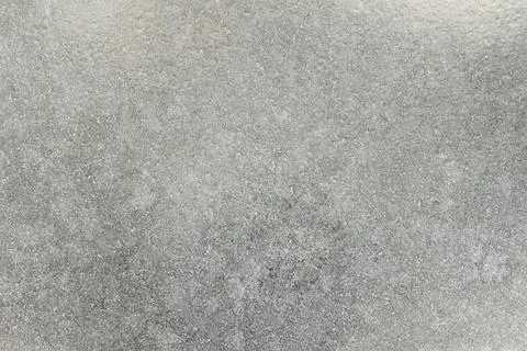 Light grey stone texture with tiny dots and uneven stains Stock Photos