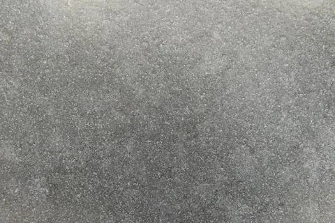 Light grey stone texture with tiny dots and uneven stains 写真素材
