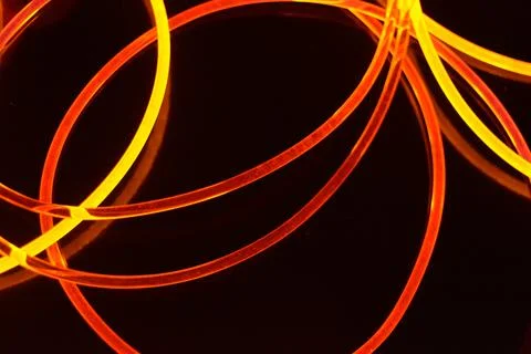 Light guides transparent wire, polyethylene tubes, rods of red, orange, yellow. Foto stock