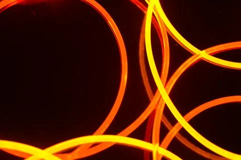 Light guides transparent wire, polyethylene tubes, rods of red, orange, yellow. 스톡 사진