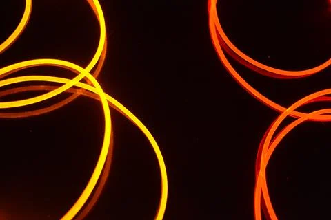 Light guides transparent wire, polyethylene tubes, rods of red, orange, yellow. 스톡 사진
