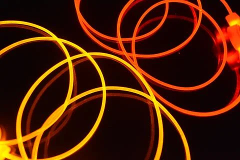 Light guides transparent wire, polyethylene tubes, rods of red, orange, yellow. 스톡 사진