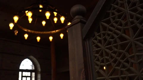 A light hanging from the ceiling inside an ancient mosque Stock-Footage 329392935