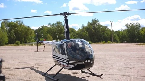 Light helicopter approach for landing Stock Footage