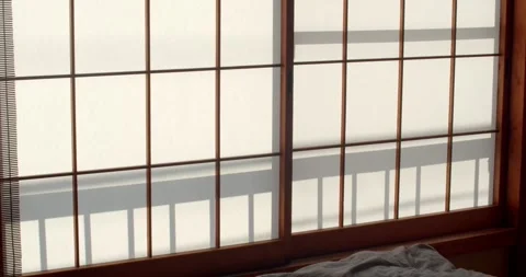 The light hitting the paper walls is unique to Japan.The design of the Japanese. Stock Footage 258849887