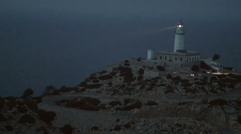 Light house working at night Cap Formentor Mallorca Stock Footage 32156838