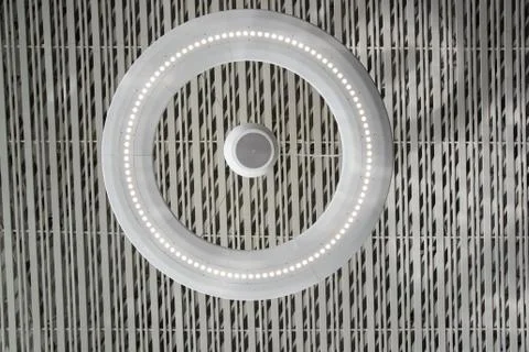 Light inside is on ceiling with classic office squares Stock Photos