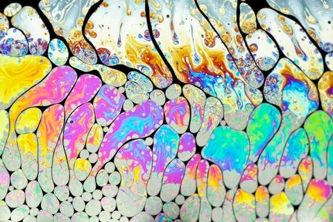 Light interference patterns on soap film Stock Photos