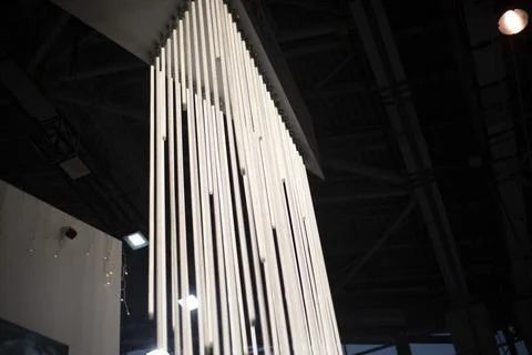 Light in the interior. Lighting devices. Networking rays. Stock Photos