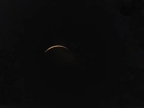 Light just touching the moon's surface look through telescope, stargazing, .. Stock Photos