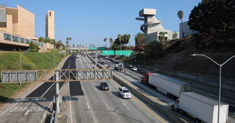 Light LA Traffic On Sunny Freeway Stock Footage 147280764