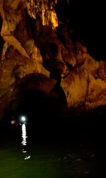 Light the lamp in the cave can be seen in the dark. Stock Photos
