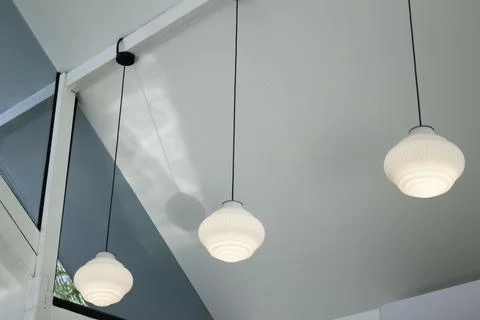 Light lamp hanging from the ceiling Stock Photos