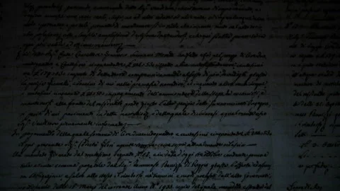 The light of a lamp illuminates an ancient manuscript of 1700 century 스톡 동영상 147605942