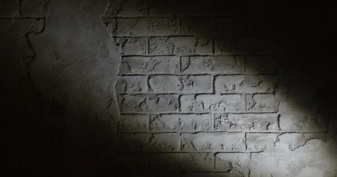 Light of a lantern on a background of an old brick wall. Stock Footage 94912324