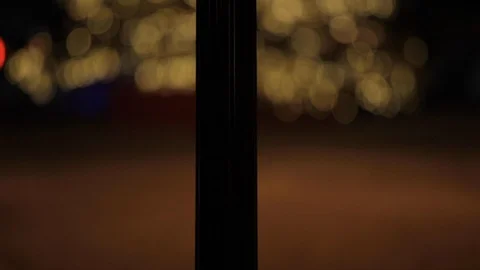 Light Up Lantern at Night in Front of Christmas Tree Stock Footage 112946563