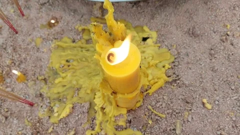 Light a large candle Stockbeeldmateriaal 276281555