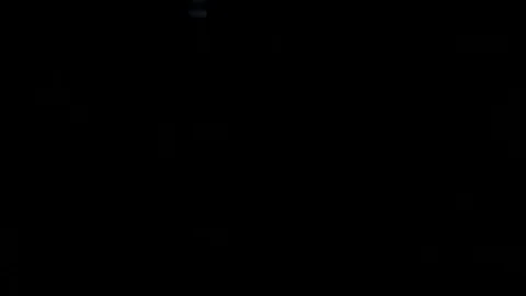 Light leak in 4K quality on dark background with.Real lens flare Video stock 81284986