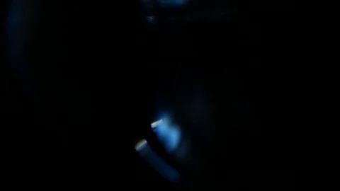 Light leak in 4K quality on dark background with.Real lens flare Stock Footage 81320579
