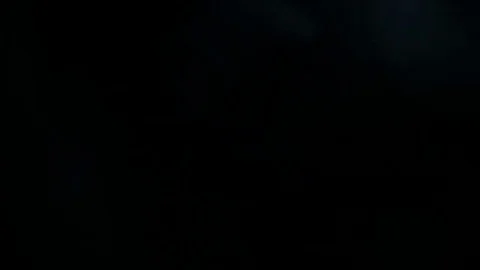 Light leak in 4K quality on dark background with.Real lens flare Stock Footage 81321558
