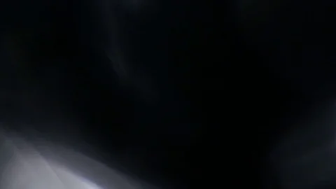 Light leak in 4K quality on dark background with.Real lens flare Stock Footage 81334032