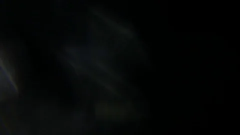 Light leak in 4K quality on dark background with.Real lens flare Stock Footage 81335831