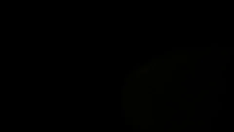 Light leak in 4K quality on dark background with.Real lens flare Stock-Footage 81342209