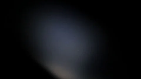 Light leak in 4K quality on dark background with.Real lens flare Video stock 81342242