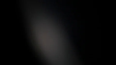Light leak in 4K quality on dark background with.Real lens flare Video stock 81342271