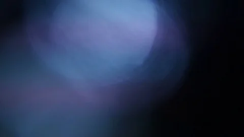 Light leak in 4K quality on dark background with.Real lens flare Stock Footage 81343039