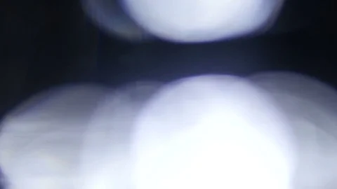 Light leak in 4K quality on dark background with.Real lens flare Stock Footage 81381448