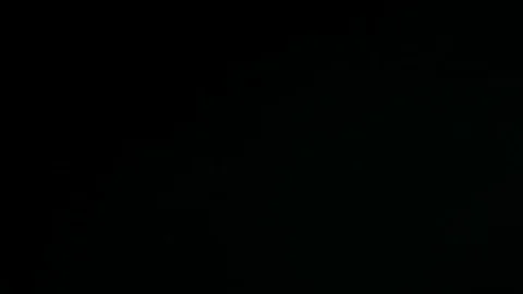 Light leak in 4K quality on dark background with.Real lens flare Stock Footage 81402612