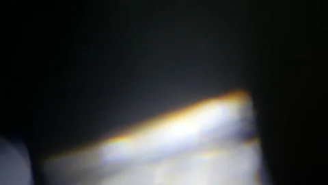 Light leak in 4K quality on dark background with.Real lens flare Stock Footage 81408155
