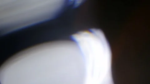 Light leak in 4K quality on dark background with.Real lens flare Stock Footage 81410354