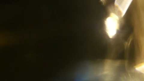Light leak in 4K quality on dark background with.Real lens flare Stock Footage 83238784