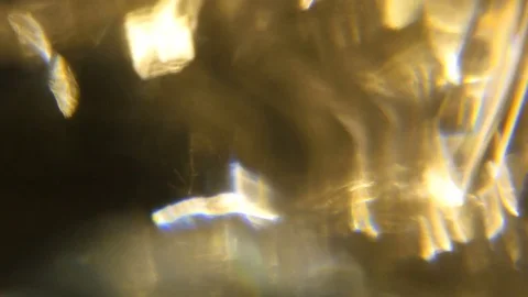 Light leak in 4K quality on dark background with.Real lens flare Stock-Footage 83239827