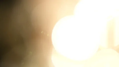 Light leak in 4K quality on dark background with.Real lens flare Stock Footage 83245604