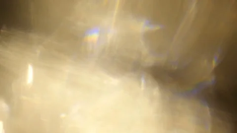 Light leak in 4K quality on dark background with.Real lens flare Stock Footage 83248585