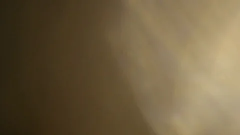 Light leak in 4K quality on dark background with.Real lens flare Stock Footage 83248590