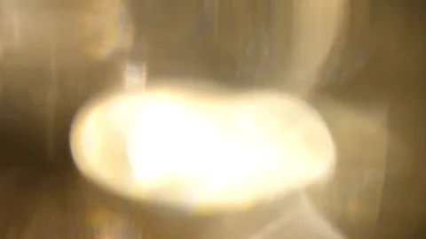 Light leak in 4K quality on dark background with.Real lens flare Stock Footage 83256745