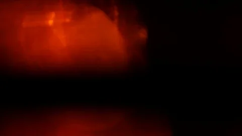 Light leak in 4K quality on dark background with.Real lens flare Stock Footage 83257725