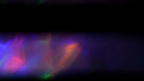 Light leak in 4K quality on dark background with.Real lens flare Stock Footage 83257989