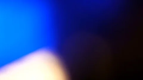 Light leak in 4K quality on dark background with.Real lens flare Stock Footage 85083964