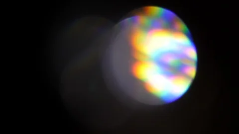 Light leak in 4K quality on dark background with.Real lens flare Stock Footage