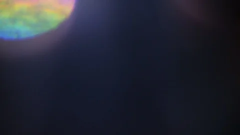 Light leak in 4K quality on dark background with.Real lens flare Stock Footage 86688405
