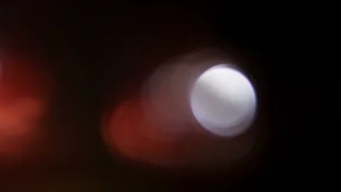 Light leak in 4K quality on dark background with.Real lens flare Stock Footage 86698588