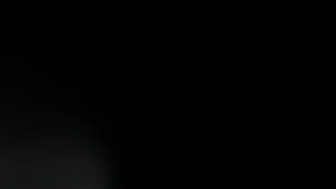 Light leak in 4K quality on dark background with.Real lens flare Stock Footage 86704039