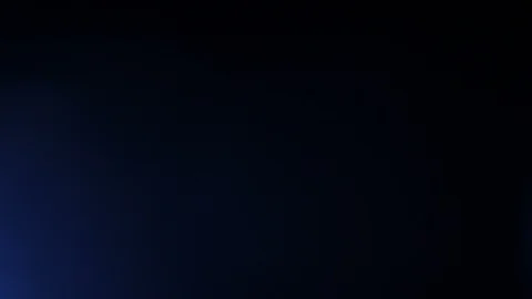 Light leak in 4K quality on dark background with.Real lens flare Stock Footage 86708606