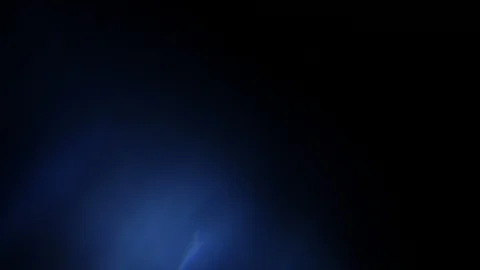 Light leak in 4K quality on dark background with.Real lens flare Stock Footage 86710793