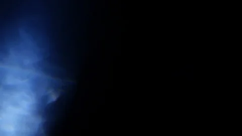 Light leak in 4K quality on dark background with.Real lens flare Stock Footage 86712392